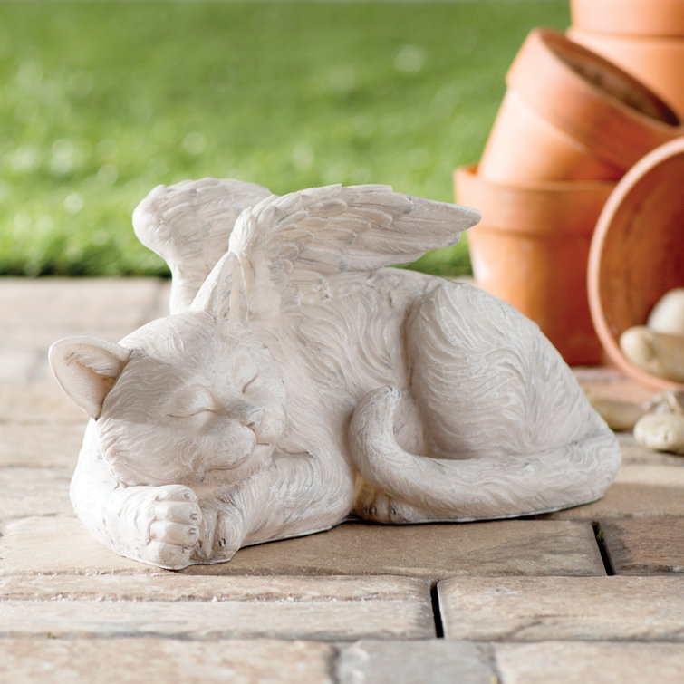 dog and cat statues